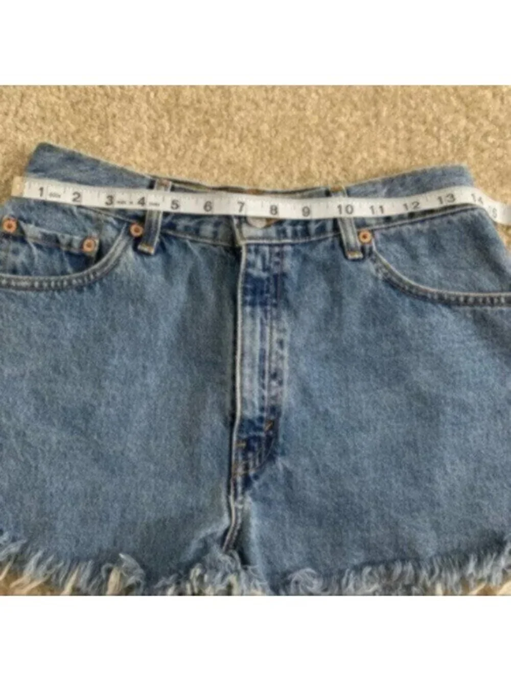 Levi’s 550 Original Raw-Edge Denim Shorts - Picture 6 of 11